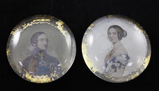 A pair of English reverse painted glass paperweights, circa 1850, 8cm